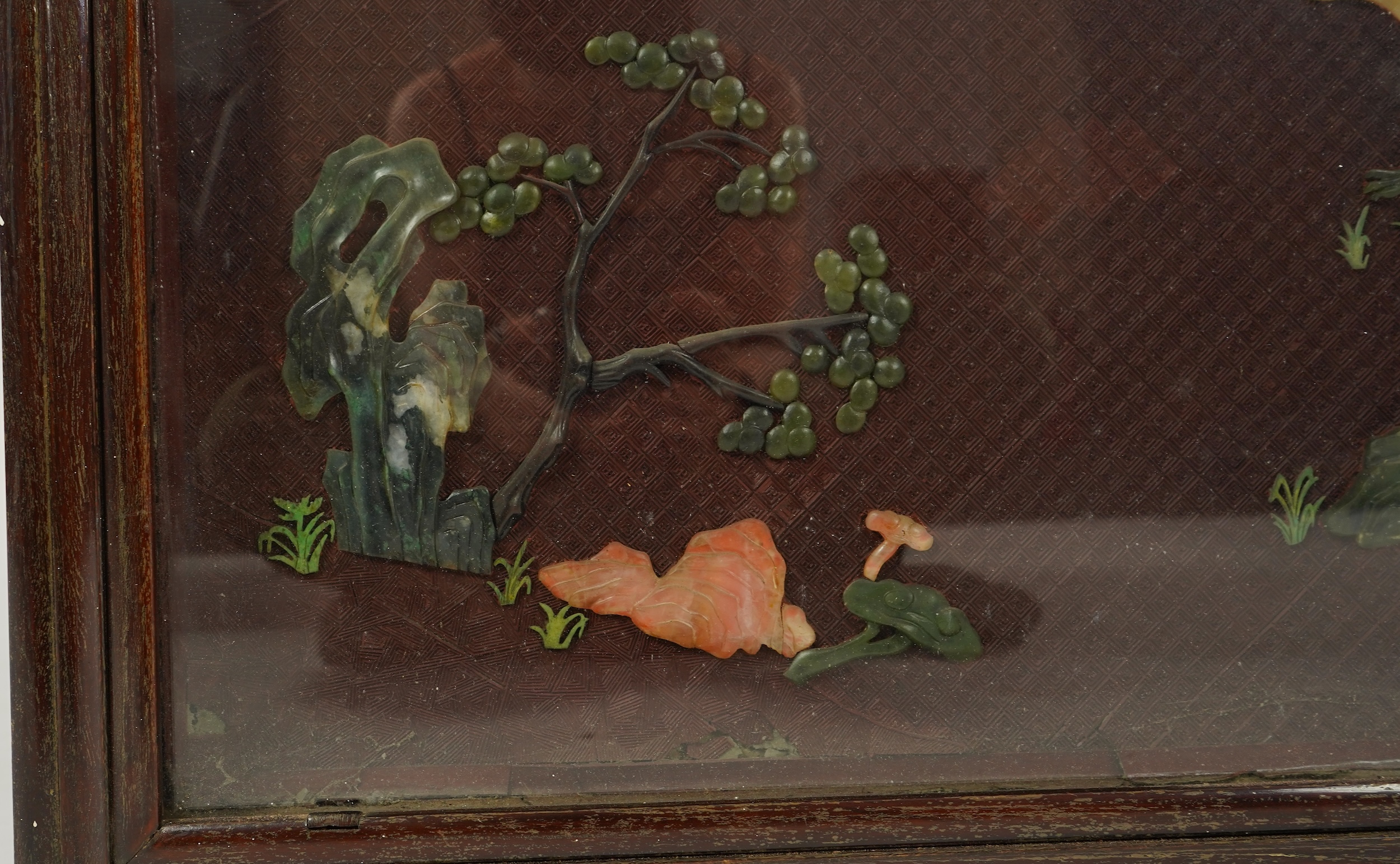 A Chinese carved cinnabar lacquer and hardstone mounted panel, early 20th century